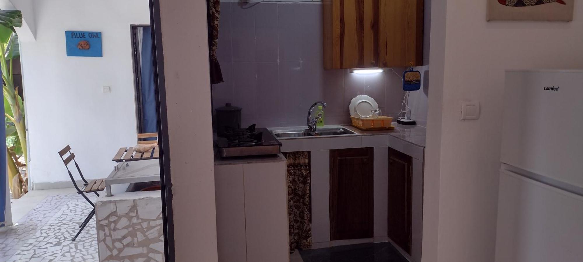 Unique Owl Apartments Sanyang Habitación foto